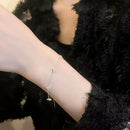 <tc>Vierblättriges Blumenarmband mit Zirkon</tc>