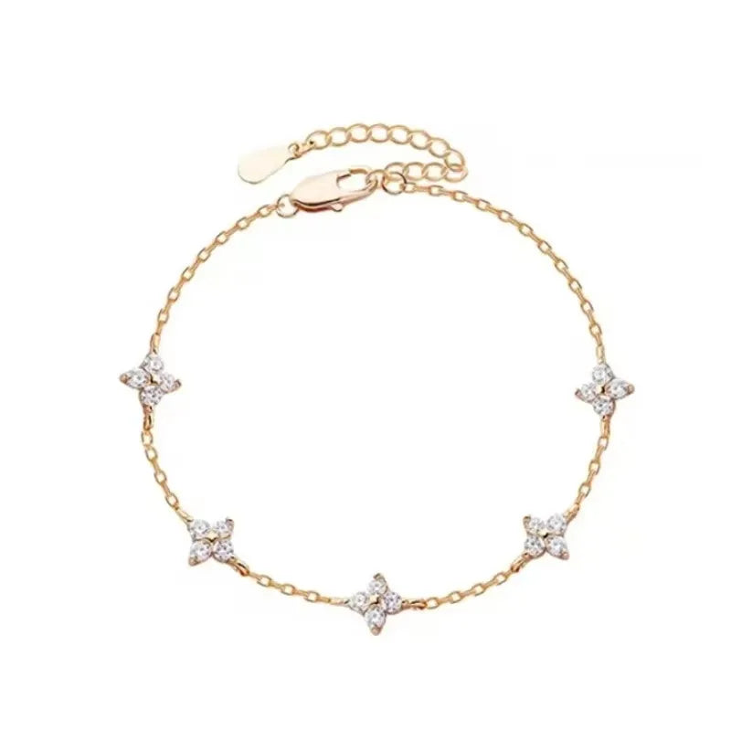 <tc>Vierblättriges Blumenarmband mit Zirkon</tc>