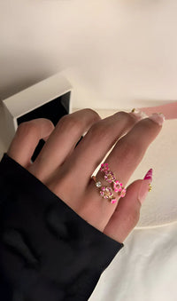 Zarter Blumenring mit rosa und weißem Zirkon