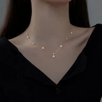 <tc>Vierblättriges Blumenarmband mit Zirkon</tc>